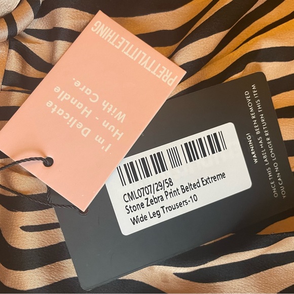 PrettyLittleThing High Waisted Wide Leg Zebra Print Pants - Picture 7 of 7